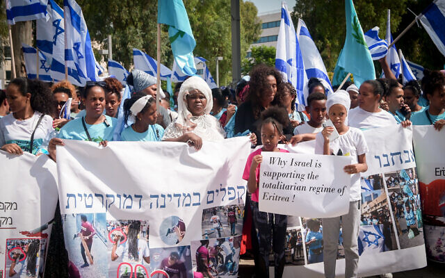 Members of the Eritrean community in Israel protest their living situation outside police headquarters in south Tel Aviv, October 5, 2023. (Avshalom Sassoni/Flash90) Members of the Eritrean community in Israel protest their living situation outside police headquarters in south Tel Aviv, October 5, 2023. (Avshalom Sassoni/Flash90)