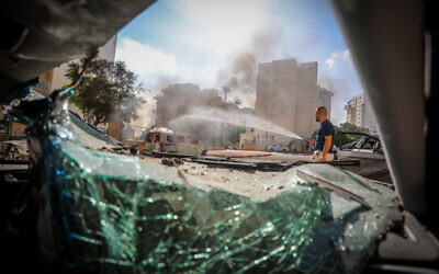 The scene where a rocket fired from Gaza caused damage in the southern city of Ashkelon on October 7, 2023. (Jamal Awad/Flash90)