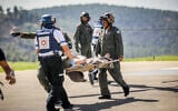 Wounded Israeli soldiers arrive at the Hadassah Ein Kerem Hospital in Jerusalem, October 7, 2023. (Noam Revkin Fenton/ Flash90)