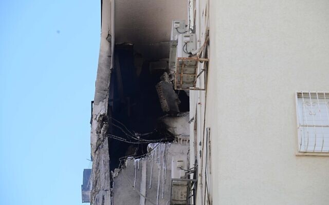 The scene after a rocket fired from Gaza hit a building in North Tel Aviv on October 7, 2023 (Tomer Neyberg/Flash90) The scene after a rocket fired from Gaza hit a building in North Tel Aviv on October 7, 2023 (Tomer Neyberg/Flash90)