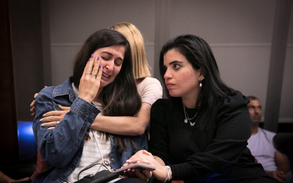 Families of civilians missing since Hamas gunmen entered Israel on October 7, 2023, hold a press conference in Kfar Maccabiah, Ramat Gan, October 8, 2023. (Miriam Alster/Flash90)