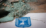 A rocket fired from the Gaza Strip by Palestinian terrorists hits a building in the southern Israeli city of Ashkelon on October 9, 2023. (Chaim Goldberg/Flash90)