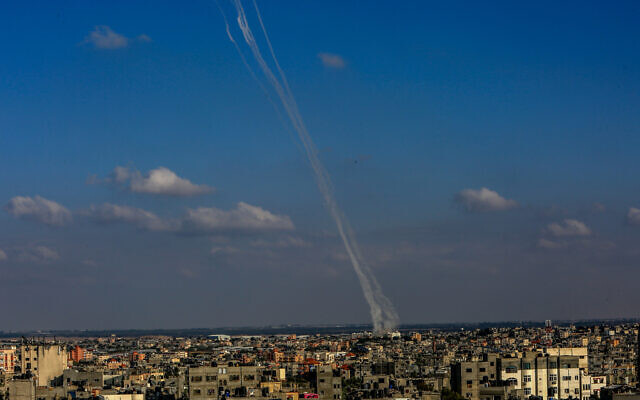 Rockets are fired from Gaza towards Israel as it seen from Rafah, in the southern Gaza Strip, October 10, 2023. (Abed Rahim Khatib/Flash90) Rockets are fired from Gaza towards Israel as it seen from Rafah, in the southern Gaza Strip, October 10, 2023. (Abed Rahim Khatib/Flash90)