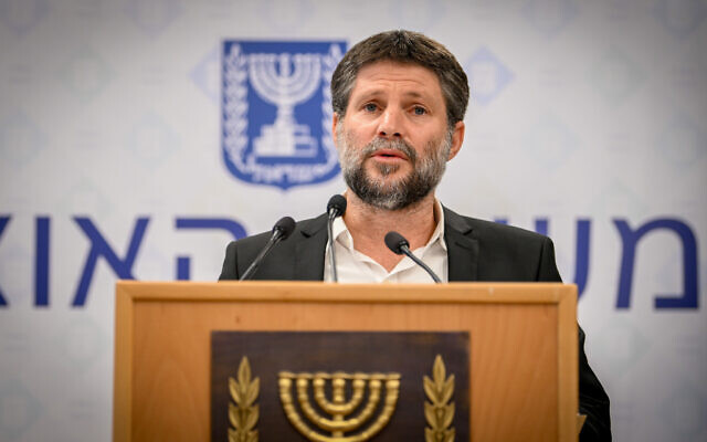 Finance Minister Bezalel Smotrich speaks at a press conference at the Finance Ministry in Jerusalem on October 15, 2023. (Arie Leib Abrams/Flash90) Finance Minister Bezalel Smotrich speaks at a press conference at the Finance Ministry in Jerusalem on October 15, 2023. (Arie Leib Abrams/Flash90)