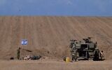 IDF Artillery Corps seen at a staging area near the southern Israeli border with Gaza, October 15, 2023. (Tomer Neuberg/Flash90)