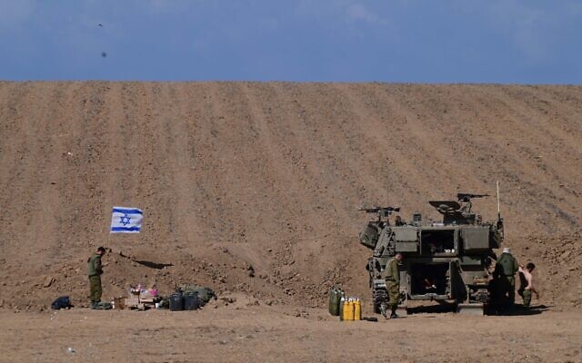 IDF Artillery Corps seen at a staging area near the southern Israeli border with Gaza, October 15, 2023. (Tomer Neuberg/Flash90) IDF Artillery Corps seen at a staging area near the southern Israeli border with Gaza, October 15, 2023. (Tomer Neuberg/Flash90)