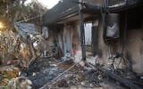 A home destroyed by Hamas terrorists on October 7 in southern Israel's Kibbutz Kfar Aza is seen on October 15, 2023. (Edi Israel/Flash90)