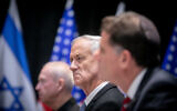 Minister Benny Gantz seen during a meeting of with Prime Minister Benjamin Netanyahu and US President Joe Biden in Tel Aviv, October 18, 2023. (Miriam Alster/ Flash90)