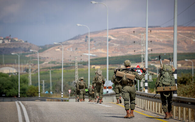 Israeli soldiers patrol near the border with Lebanon, northern Israel, October 19, 2023. (David Cohen/Flash90) Israeli soldiers patrol near the border with Lebanon, northern Israel, October 19, 2023. (David Cohen/Flash90)