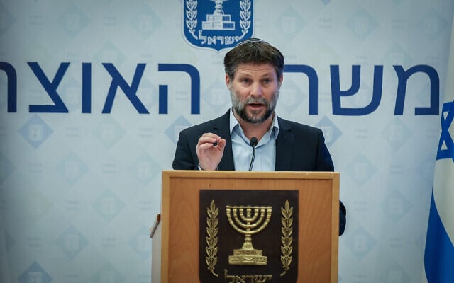 Finance Minister Bezalel Smotrich attends a press conference at the Finance Ministry in Jerusalem on October 19, 2023. (Noam Revkin Fenton/Flash90)