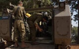 Reserve soldiers seen at a staging area near the Israeli border with Lebanon, northern Israel, October 23, 2023 (Ayal Margolin/Flash90)