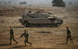 IDF troops train in a military exercise in the Golan Heights on October 23, 2023 (Michael Giladi/Flash90)