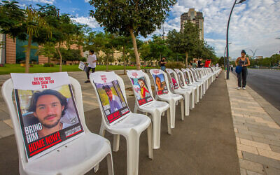 Images of the hostages held by the Hamas terror group in Gaza are on display in the southern Israeli city of Beersheba, October 27, 2023. (Flash90)