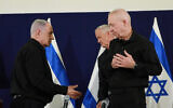 Israeli Prime Minister Benjamin Netanyahu, Minister of Defense Yoav Gallant, and head of the National Unity party Benny Gantz hold a joint press conference at the Ministry of Defense, in Tel Aviv on October 28, 2023. (Dana Kopel/POOL)
