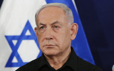 Prime Minister Benjamin Netanyahu speaks at a press conference at the Defense Ministry in Tel Aviv, October 28, 2023. (Dana Kopel/POOL)