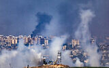 Smoke rises during Israeli airstrikes, in the Gaza Strip, as seen from the Israeli side of the border, on October 28, 2023. (Yonatan Sindel/Flash90)