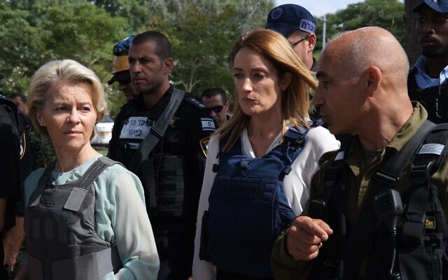 European Commission President Ursula von der Leyen (L) visits Kfar Aza on October 13, 2023. (Ursula von der Leyen/X) European Commission President Ursula von der Leyen (L) visits Kfar Aza on October 13, 2023. (Ursula von der Leyen/X)