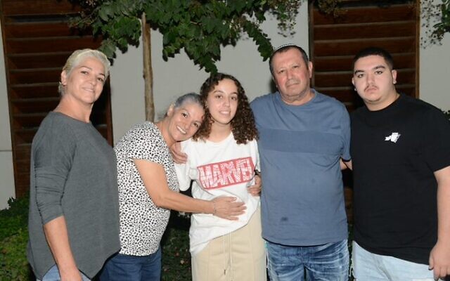 IDF soldier Pvt. Ori Megidish (center) with her family after being rescued from Gaza, October 30, 2023. (Shin Bet) IDF soldier Pvt. Ori Megidish (center) with her family after being rescued from Gaza, October 30, 2023. (Shin Bet)
