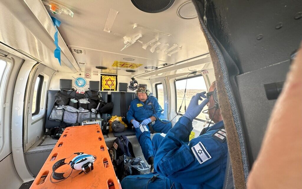 Illustrative: Magen David Adom paramedics ride in an air ambulance, en route to evacuate injured from Hamas's October 7, 2023 terror attack, killing over 1,200 Israelis and injuring over 3,000. (Courtesy)