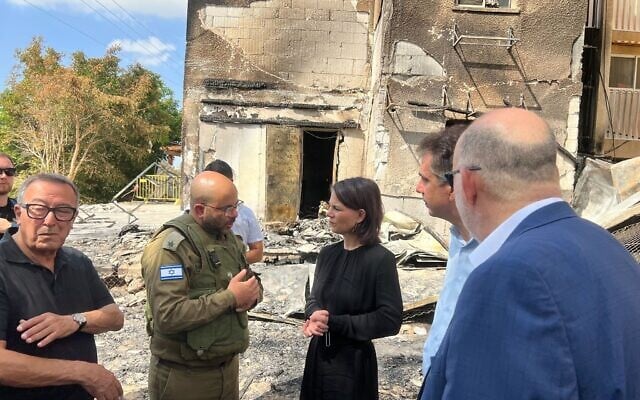 Diplomats including Germany's Foreign Minister Annalena Baerbock and Italy's Foreign Minister Antonio Tajani pay solidarity visits to southern Israel, accompanied by Foreign Minister Eli Cohen, October 13, 2023 (Lazar Berman/Times of Israel)