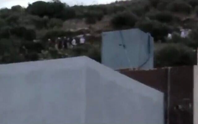 Screen capture from video of Israeli kibbutz resident leaving the West Bank Palestinian village of Jalbun, October 1, 2023. (X: Used in accordance with Clause 27a of the Copyright Law) Screen capture from video of Israeli kibbutz resident leaving the West Bank Palestinian village of Jalbun, October 1, 2023. (X: Used in accordance with Clause 27a of the Copyright Law)