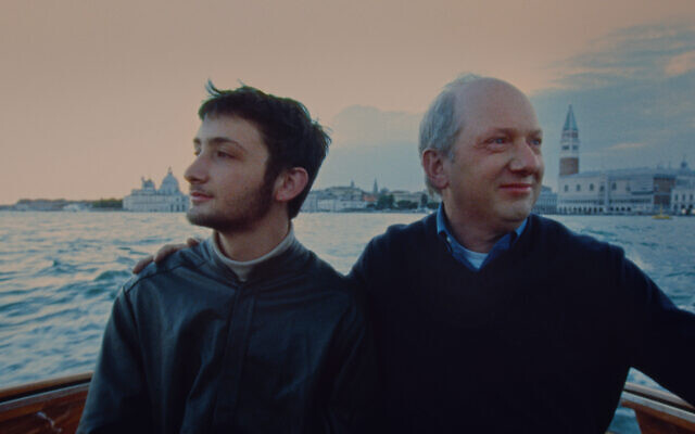 Joel (L) and Randy Schoenberg cross the Venice lagoon to visit an ancestral graveyard, in the documentary 'Fioretta.' (Rubber Ring Films)