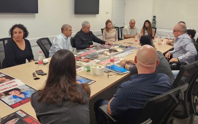 Prime Minister Benjamin Netanyahu meets with family members of those believed to be held captive in Gaza by Hamas, at an IDF base in Ramle, October 15, 2023. (Courtesy)
