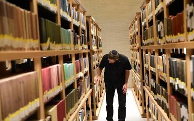 Illustrative: Readers and researchers trying out the new National Library of Israel building, in Jerusalem, as it opened unofficially on October 29, 2023. (Courtesy Yoni Kelberman)