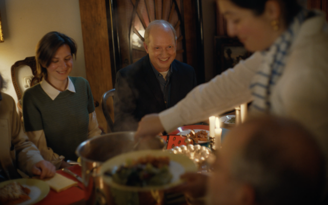 Randy Schoenberg at a dinner gathering in the documentary 'Fioretta.' (Rubber Ring Films)