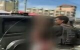 Israelis being kidnapped and taken into Gaza by Hamas terrorists, October 7, 2023, as seen in pixelated videos from social media screened on Israeli television (Channel 12 screenshot)