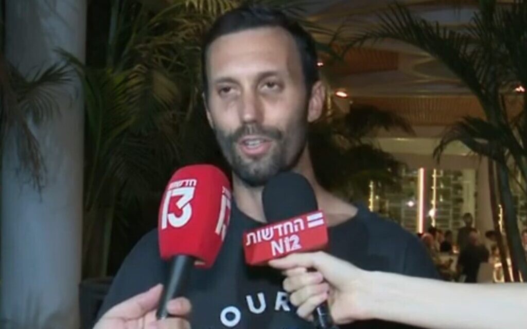 Daniel Lifshitz speaks, after learning that his grandmother, Yocheved Lifshitz, had been freed from Hamas captivity in Gaza, October 23, 2023. (Channel 12 screenshot; used in accordance with Clause 27a of the Copyright Law)