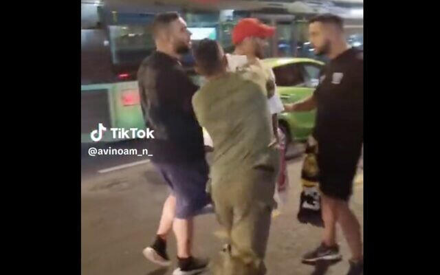 A screenshot of a video showing a non-commissioned officer attacking a fan of Hapoel Tel Aviv, after a soccer game against Beitar Jerusalem, outside the capital's Teddy Stadium, October 2, 2023. (X screenshot. Used in accordance with Clause 27a of the Copyright Law) A screenshot of a video showing a non-commissioned officer attacking a fan of Hapoel Tel Aviv, after a soccer game against Beitar Jerusalem, outside the capital's Teddy Stadium, October 2, 2023. (X screenshot. Used in accordance with Clause 27a of the Copyright Law)
