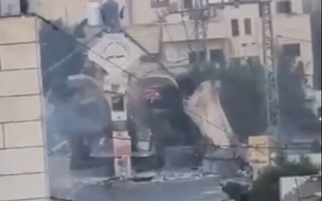 An IDF bulldozer destroys Jenin's arched gate during a raid, October 30, 2023. (Twitter video screenshot: used in accordance with Clause 27a of the Copyright Law) An IDF bulldozer destroys Jenin's arched gate during a raid, October 30, 2023. (Twitter video screenshot: used in accordance with Clause 27a of the Copyright Law)