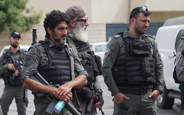 Israeli 'Fauda' series actor Tsahi Halevi, second from left, during a weapons raid in the city of Lod, October 2, 2023. (Israel Police) Israeli 'Fauda' series actor Tsahi Halevi, second from left, during a weapons raid in the city of Lod, October 2, 2023. (Israel Police)