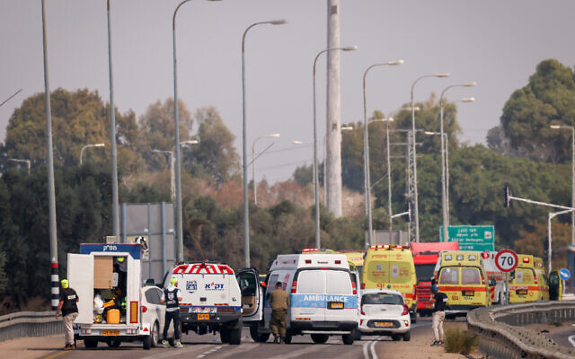 Ambulance and rescue personnel outside of the southern Israeli town of Sderot, October 8, 2023. (Chaim Goldberg/Flash90) Ambulance and rescue personnel outside of the southern Israeli town of Sderot, October 8, 2023. (Chaim Goldberg/Flash90)
