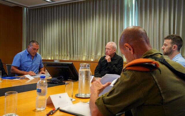Defense Minster Yoav Gallant holds an assessment at his office in Tel Aviv, October 8, 2023. (Ariel Hermoni/Defense Ministry) Defense Minster Yoav Gallant holds an assessment at his office in Tel Aviv, October 8, 2023. (Ariel Hermoni/Defense Ministry)