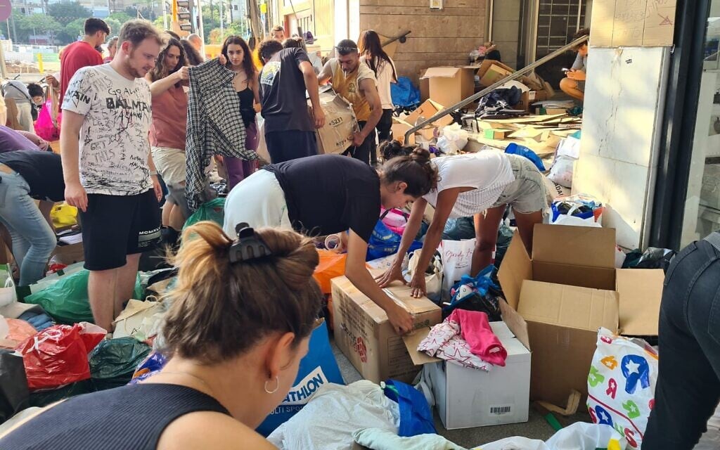 Illustrative: A clothing and equipment drive on King David Blvd in Tel Aviv for residents in the south and soldiers, on October 8, 2023. (Lizzy Shaanan/Courtesy) Illustrative: A clothing and equipment drive on King David Blvd in Tel Aviv for residents in the south and soldiers, on October 8, 2023. (Lizzy Shaanan/Courtesy)
