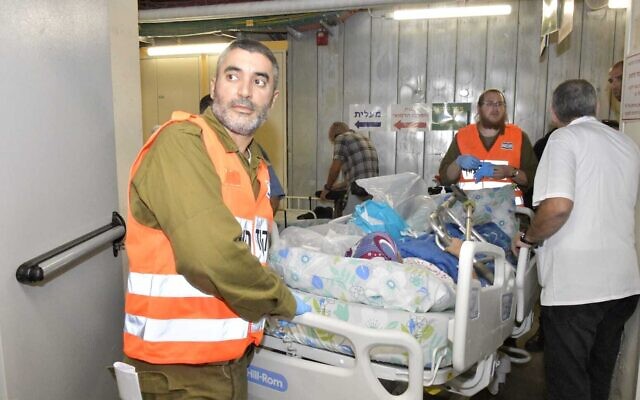 Patients being moved into Galilee Medical Center’s underground facility on October 11, 2023. (Roni Albert/Galilee Medical Center)