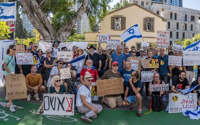 Israelis protest outside the Defense Ministry in Tel Aviv on October 14, 2023, calling on Prime Minister Benjamin Netanyahu to resign over the devastating Hamas attack that killed 1,300 people (courtesy Niki Sharir) Israelis protest outside the Defense Ministry in Tel Aviv on October 14, 2023, calling on Prime Minister Benjamin Netanyahu to resign over the devastating Hamas attack that killed 1,300 people (courtesy Niki Sharir)