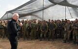 Defense Minister Yoav Gallant speaks to troops near the Gaza border, October 19, 2023. (Ariel Hermoni/ Defense Ministry)