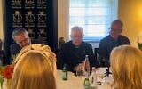 Archbishop of Canterbury Justin Welby speaks in Jerusalem on October 22, 2023, with the family of Yosef Guedalia, who fell fighting Hamas terrorists on October 7, 2023 (Lazar Berman/The Times of Israel)