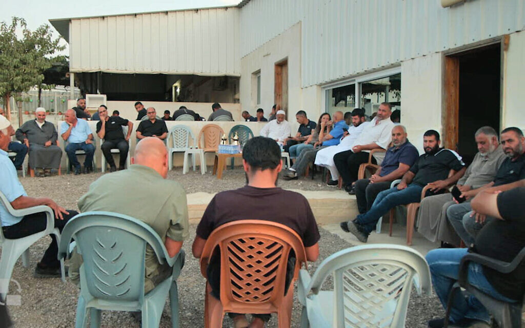 Men of the Ziyadne family during a vigil for the four members of their family kidnapped to Gaza by Hamas, in Rahat, October 30, 2023 (Eli Katzoff/ Times of Israel)