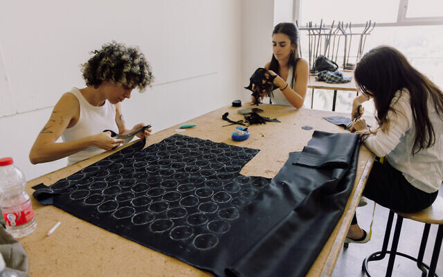 Hundreds of volunteers work in shifts every day at Tel Aviv's Shenkar design school, helping the IDF outfit gear for soldiers in the 2023 Israel-Hamas War (Courtesy Yahav Trudler)