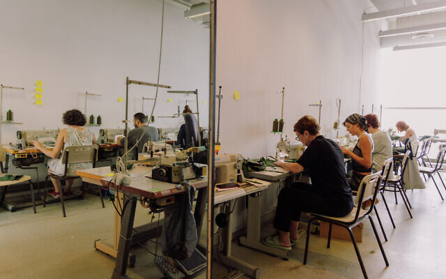 Hundreds of volunteers work in shifts every day at Tel Aviv's Shenkar design school, helping the IDF outfit gear for soldiers in the 2023 Israel-Hamas War (Courtesy Yahav Trudler)