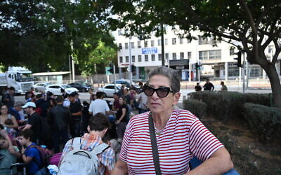 Barbara Zwillick waits to board an evacuation vessel arranged by the US Embassy from Haifa, Israel, on October 16, 2023. (Canaan Lidor/Times of Israel)