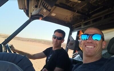 In this undated photo, Yftach Gepner (right) takes a selfie with his brother Eldad. (Courtesy, Yftach Gepner)