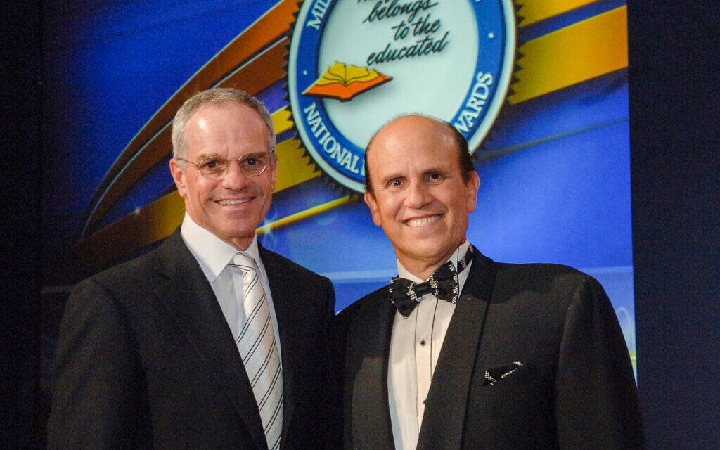 Richard Sandler, left, with Michael Milken in an undated photo. (Courtesy)