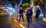 File - Police inspect the scene of riots where one person died and several were seriously injured in fight between Eritreans, in Netanya, Israel on September 30, 2023. (Flash90)