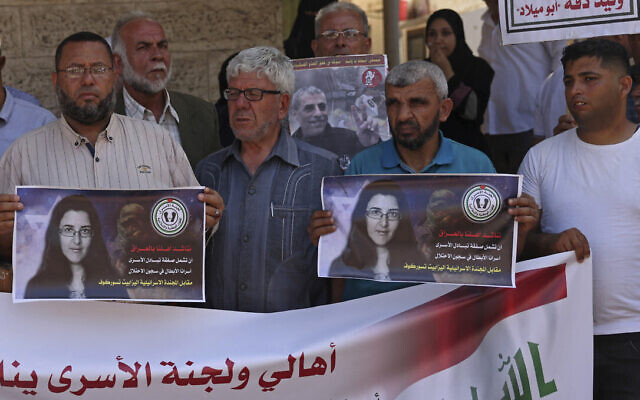 Members of the Palestinian Prisoners Committee hold a rally outside the International Committee of the Red Cross office in Gaza City on July 17, 2023, demanding the Iraqi government include Palestinian prisoners in Israeli jails in the exchange for Israeli-Russian academic Elizabeth Tsurkov. (Mohammed Abed/AFP) Members of the Palestinian Prisoners Committee hold a rally outside the International Committee of the Red Cross office in Gaza City on July 17, 2023, demanding the Iraqi government include Palestinian prisoners in Israeli jails in the exchange for Israeli-Russian academic Elizabeth Tsurkov. (Mohammed Abed/AFP)