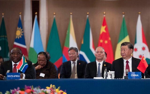 File: President of China Xi Jinping (R) and South African President Cyril Ramaphosa (L) attend the China-Africa Leaders' Roundtable Dialogue on the last day of the 2023 BRICS Summit in Johannesburg on August 24, 2023. (ALET PRETORIUS / POOL / AFP) File: President of China Xi Jinping (R) and South African President Cyril Ramaphosa (L) attend the China-Africa Leaders' Roundtable Dialogue on the last day of the 2023 BRICS Summit in Johannesburg on August 24, 2023. (ALET PRETORIUS / POOL / AFP)